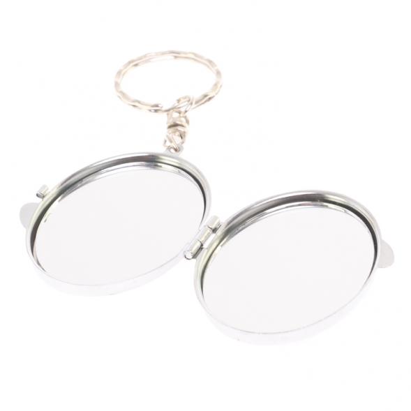 Складное зеркало брелок из сиреневого флюорита овальное 126594