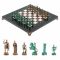 Шахматы "Римские воины" фигуры бронза / патина 28х28 см из мрамора и лемезита
