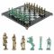 Шахматы "Римляне против Галлов" фигуры бронза / патина 36х36 см серый мрамор
